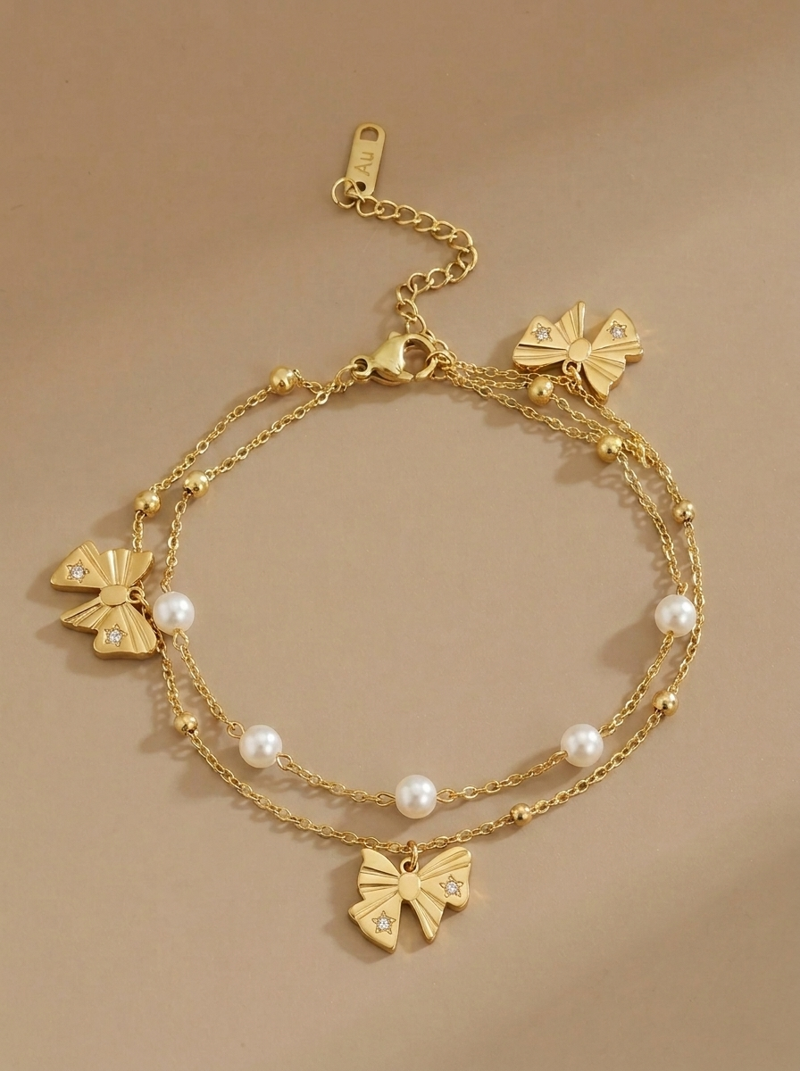 Elara Bow & Pearl Drop Bracelet